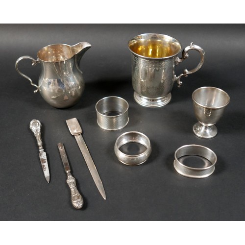 28 - A small group of silver items, comprising a Victorian christening mug, engraved 'Helen', 10cm high, ... 