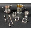 A small group of silver items, comprising a Victorian christening mug, engraved 'Helen', 10cm high, ... 