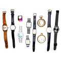 A group of eight wristwatches, two pocket watches, and a plastic ring, comprising a Cyma De Luxe Wat... 