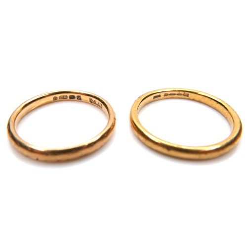 245 - A group of five 22ct yellow gold wedding band rings, comprising one 2.1mm wide, size L/M, 2.9g, one ... 