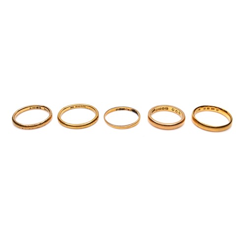 245 - A group of five 22ct yellow gold wedding band rings, comprising one 2.1mm wide, size L/M, 2.9g, one ... 