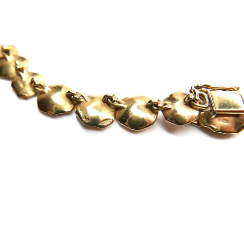 255 - An 18ct yellow gold necklace, in the style of Van Cleef & Arpels, formed as a pale pink frosted glas... 