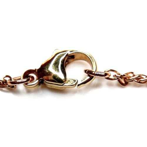 257 - A contemporary 18ct rose gold necklace, with a pendant in the form of a figure 8, set with a princip... 