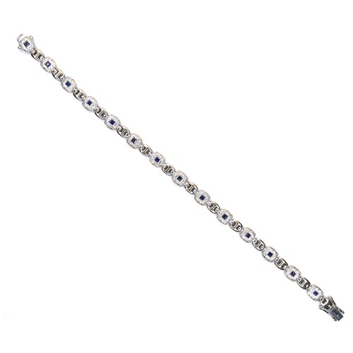 250 - An 18ct white gold, sapphire and diamond bracelet, fourteen cushion shaped panels, each set with a s... 