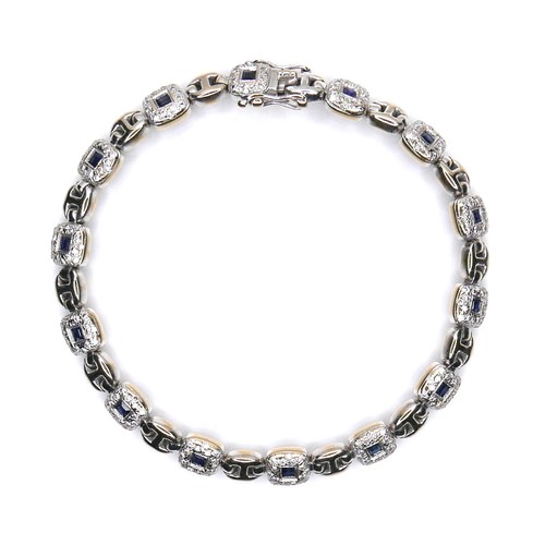 250 - An 18ct white gold, sapphire and diamond bracelet, fourteen cushion shaped panels, each set with a s... 