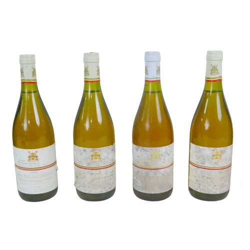 129 - Vintage wine: a mixed parcel of white wine, comprising two bottles of Alain Gueneau Sancerre 1988, a... 