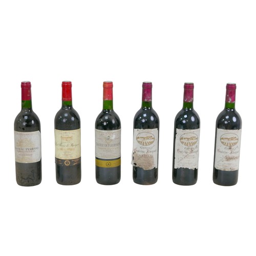 140 - Vintage wine: a mixed parcel of Bordeaux region wines, comprising three bottles of Chateau Guerin-Ja... 