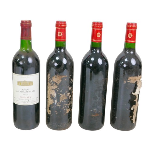 142 - Vintage wine: a mixed parcel of Bordeaux region red wines, comprising two bottles of Chateau Le Gard... 