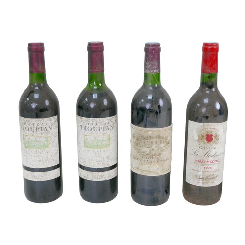 125 - Vintage wine: a mixed parcel of Haut-Medoc red wine, comprising two bottles Chateau Haut-Duriez  199... 