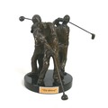 Jack Brendlinger (American, 20th century): 'The Swing' a bronze sculpture capturing a golf swing in ... 