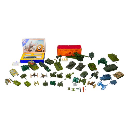 99 - A collection of die-cast military model vehicles, including a Britains 155mm artillery gun with orig... 