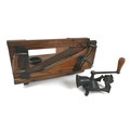 A Victorian / Edwardian bread slicer, with wooden frame metal fittings, horizontal guillotine action... 
