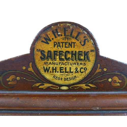 70 - A Victorian Sovereign change machine 'W. H. Ell's Patent Safecheck', the mahogany cabinet with glaze... 