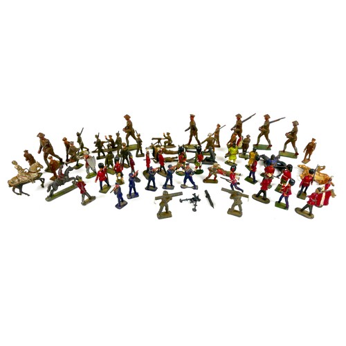 87 - A collection of vintage model cast metal military figures, mostly Britains lead WWI era soldiers and... 