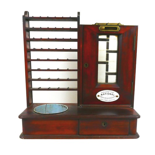 71 - A Victorian mahogany National Cash Register gold coin changer, designed by John Cox, to the left eig... 