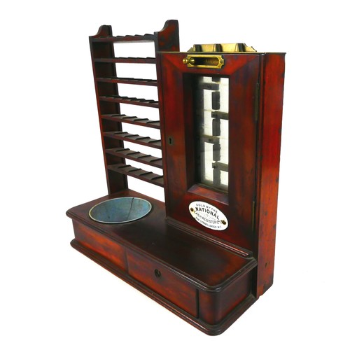 71 - A Victorian mahogany National Cash Register gold coin changer, designed by John Cox, to the left eig... 