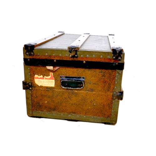 190 - An Edwardian travelling trunk, wooden bound and leather effect covering, labelled inside 'H. Dumioan... 