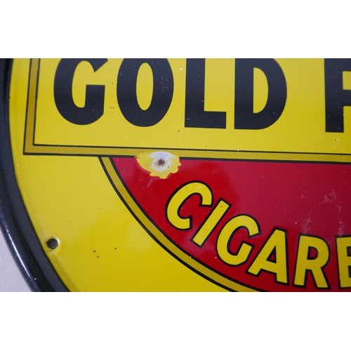 187 - An early 20th century Gold Flake Will's Cigarettes enamel advertising sign, circular single sided, b... 