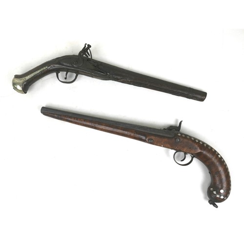 67 - Two antique pistols, one a flintlock, the other a percussion cap, both with inlaid decoration, 46 an... 