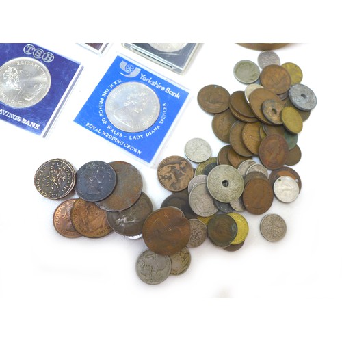 79 - A mixed collection of stamps and coins, including a Penny Black and Penny Red. (2 bags)