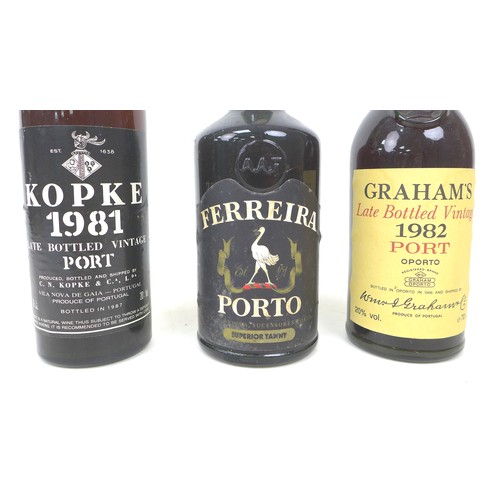 123 - Three bottles of vintage port, including a Kopke 1981, Ferreira Porto, and Graham's 1982. (3)