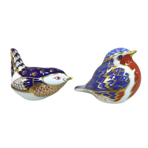 41 - A group of four Royal Crown Derby bone china items, comprising ‘Robin’ paperweight, ‘Wren’ paperweig... 
