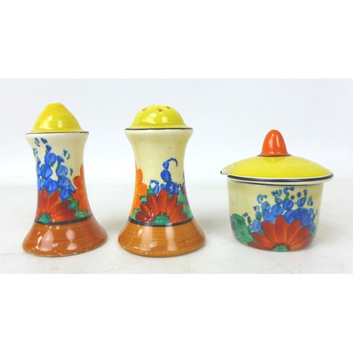 46 - A Clarice Cliff 'Gay Day' Muffineer cruet set, Bizarre mark to the base, tallest 8cm high. (3)