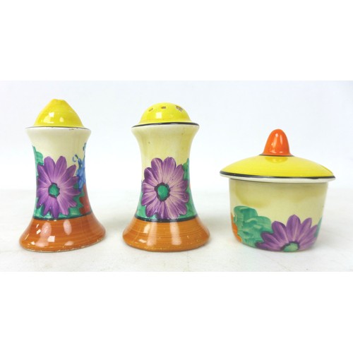46 - A Clarice Cliff 'Gay Day' Muffineer cruet set, Bizarre mark to the base, tallest 8cm high. (3)