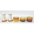A collection of Clarice Cliff banded wares, including a Muffineer salt and pepper pot, 8cm high, and... 