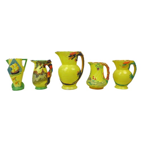 27 - A group of predominantly Burleigh Ware Art Deco jugs, including a Highwayman and Dragon design, a/f,... 