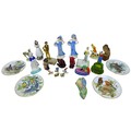 A group of ceramic figurines, including two Royal Doulton Flambe animals, modelled as a cat and fox,... 