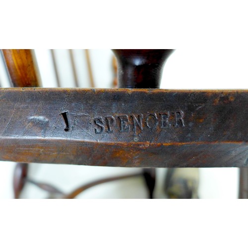 268 - An early 19th century oak and elm Windsor chair, with pierced splat and spindle back, raised on turn... 