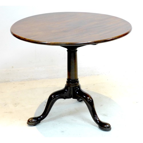 273 - A Georgian mahogany tea table, circular tilt top, birdcage revolving movement on gun barrel column, ... 