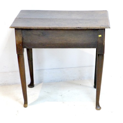 263 - An early Georgian oak lowboy, with single drawer, brass swan neck handle, raised on turned tapering ... 