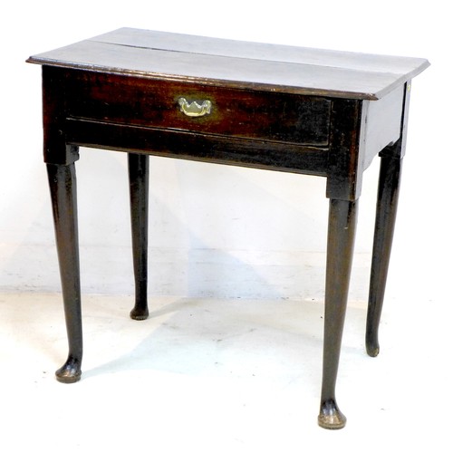 263 - An early Georgian oak lowboy, with single drawer, brass swan neck handle, raised on turned tapering ... 