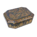 A 19th century Chinoiserie octagonal form lacquer trinket box, decorated with oriental island scenes... 