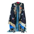 An early 20th century Japanese embroidered silk kimono, decorated with exotic flowers and birds upon... 