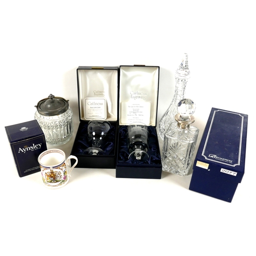 14A - A group of cut glass items, comprising a Broadway silver mounted decanter, a Stuart cut crystal deca... 