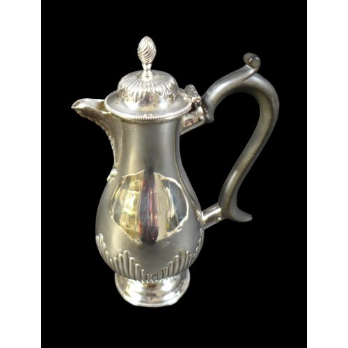 73 - A Victorian silver coffee pot, of baluster form with reeded decoration, ebonised handle, on a circul... 
