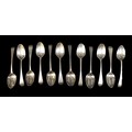 Two sets of six George IV silver teaspoons, comprising one set of six with engraved with initial 'L'... 