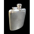 A George VI silver hip flask, with presentation inscription 'Presented to Alex West. Esq., By the Ea... 