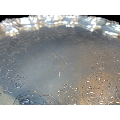85 - A Victorian silver tray, of hexagonal form, engraved with initials 'HS' to its centre, scroll and sh... 