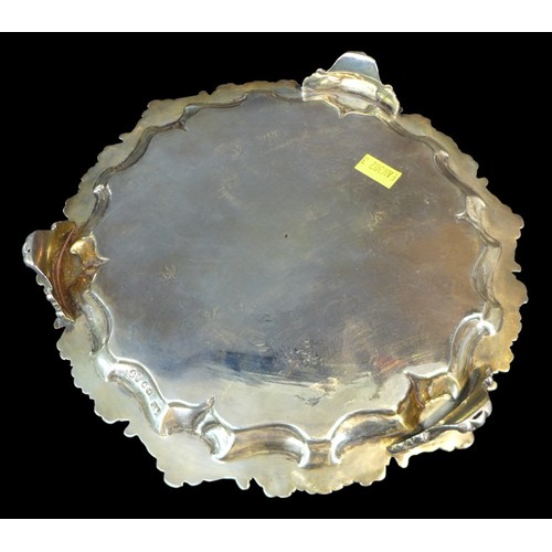 85 - A Victorian silver tray, of hexagonal form, engraved with initials 'HS' to its centre, scroll and sh... 