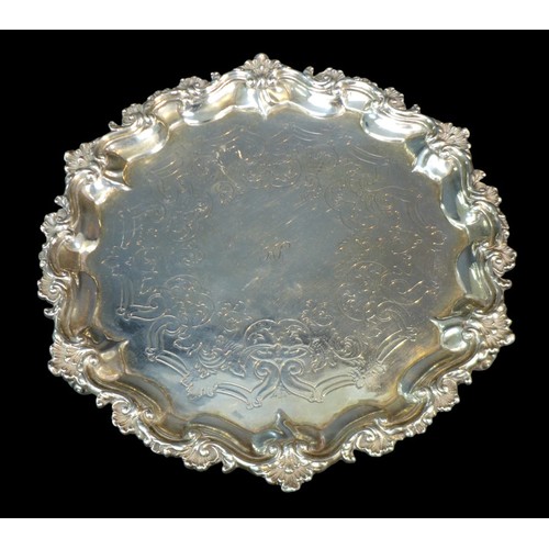 85 - A Victorian silver tray, of hexagonal form, engraved with initials 'HS' to its centre, scroll and sh... 