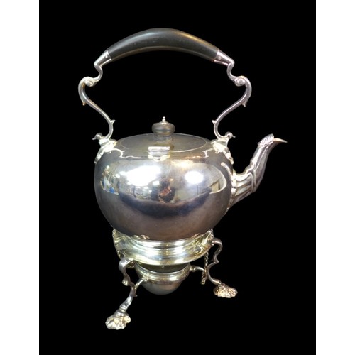 103 - A Victorian silver spirit kettle on stand, with ebonised handle and finial, two removable pins to it... 