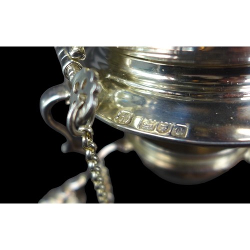 103 - A Victorian silver spirit kettle on stand, with ebonised handle and finial, two removable pins to it... 