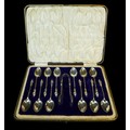 An Edwardian cased set of twelve silver Apostles spoons and sugar tongs, Charles Wilkes Birmingham 1... 