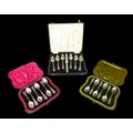Three Edwardian and later cased sets of silver flatware, comprising a set of six Edwardain teaspoons... 