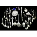 A collection of assorted British and continental silver and white metal flatware, including a Victor... 