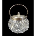 A 20th century cut glass and silver lidded bowl, with engraved swing handle, Walker & Hall, Sheffiel... 